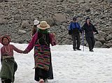 Tibet Kailash 09 Kora 12 Crossing Small Tongue of Ice We gingerly crossed the small tongue of ice on our descent from the Dlma La to the Eastern Valley floor. Easy does it for the Westerners, skip on by for the Pilgrims.